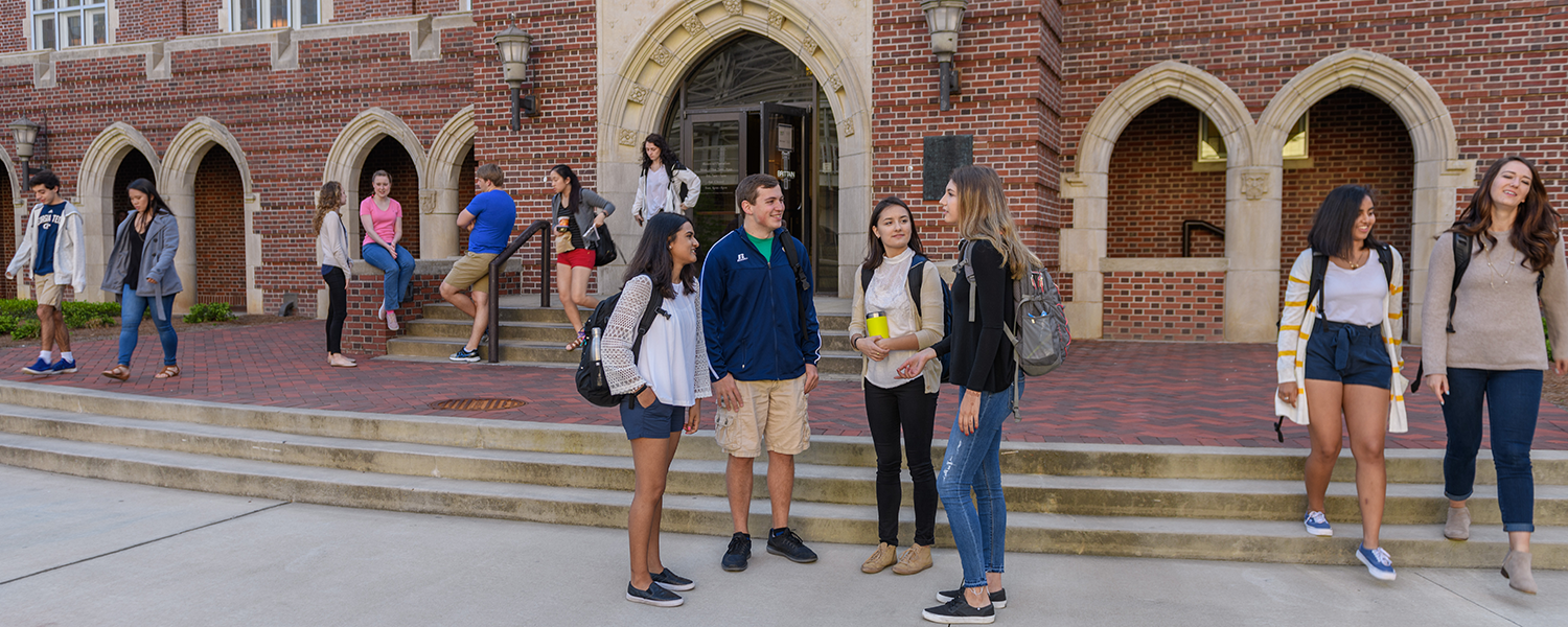 GT students talking and walking around the residence halls.