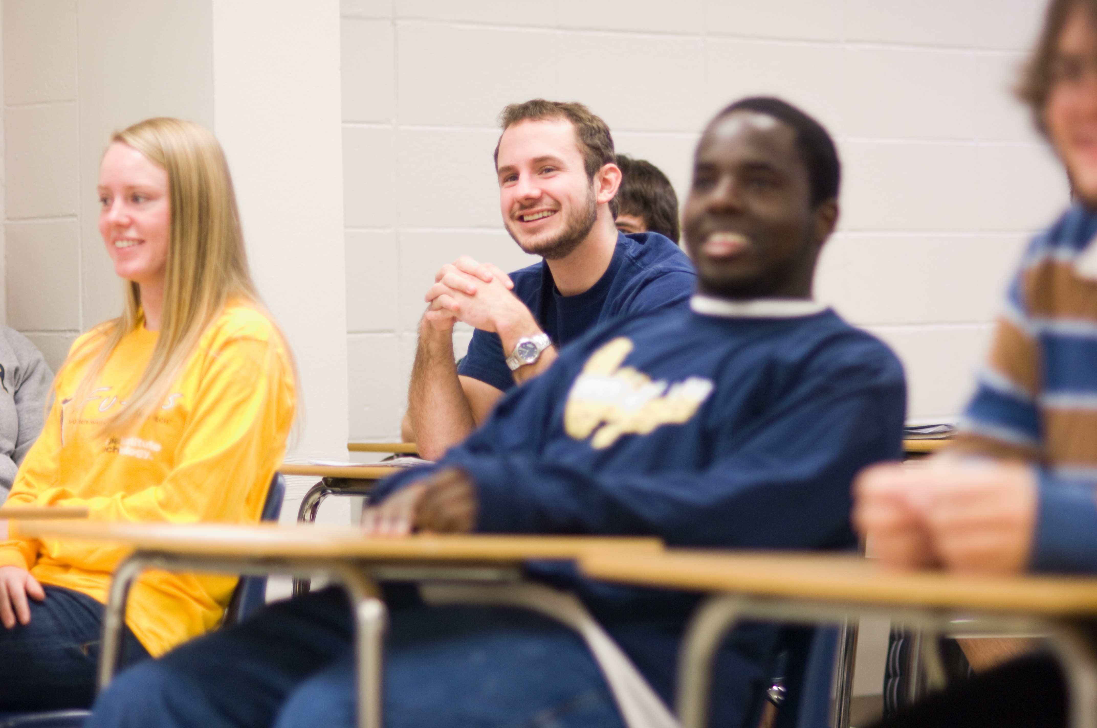 Students participate in group discussions in a GT1000 class in the Skiles building.